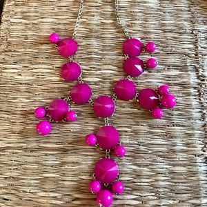 Hot pink bauble necklace on gold chain